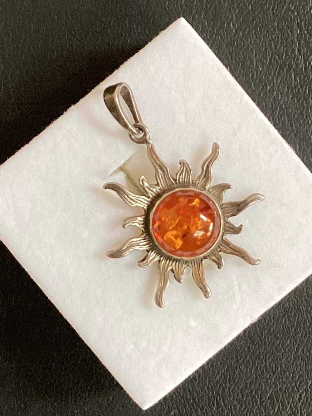 Sterling Silver Sunburst Pendant with Orange Amber Cabochon